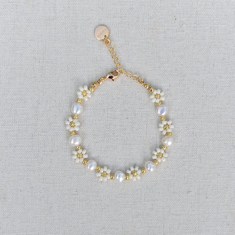 Blomster armbånd - krem